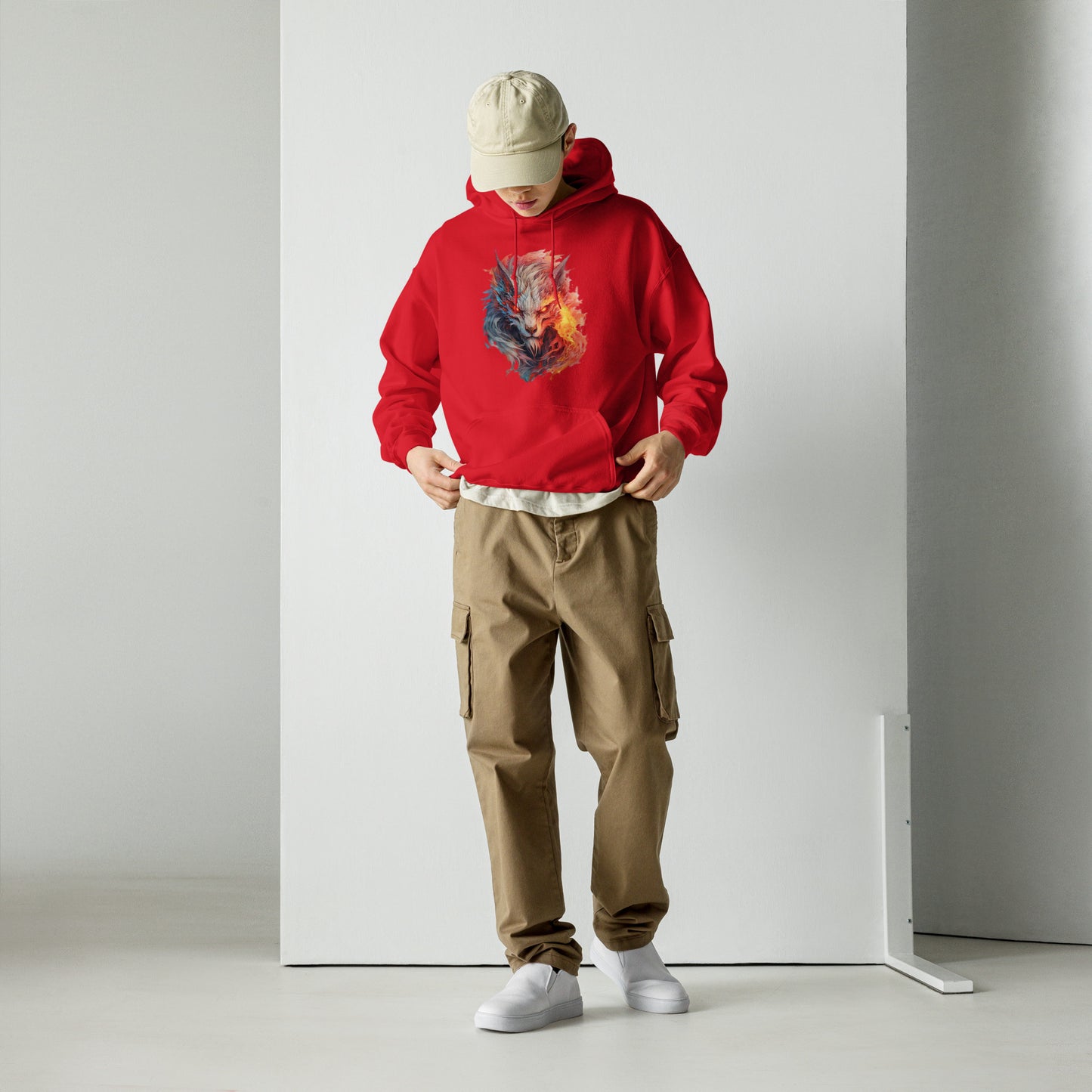 Frivole Unisex rode heavy blend hoodie met levendig Kleurrijk Wolf patroon, gedragen door een jonge man, op een wit stuk houtachtergrond,