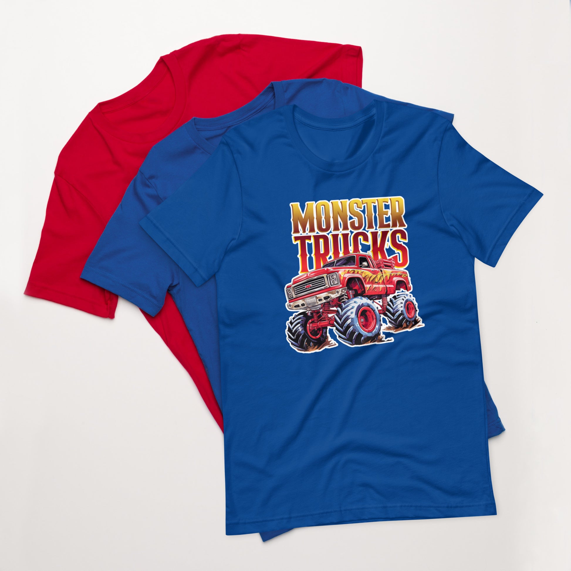 Drie unisex T-shirts gestapeld in rood , true royal, blauw  met een afbeelding van een monster truck op een witte achtergrond, vooraanzicht